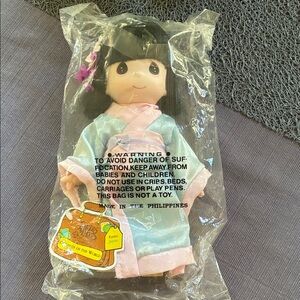 Precious Moments Doll in Pink and Blue Attire